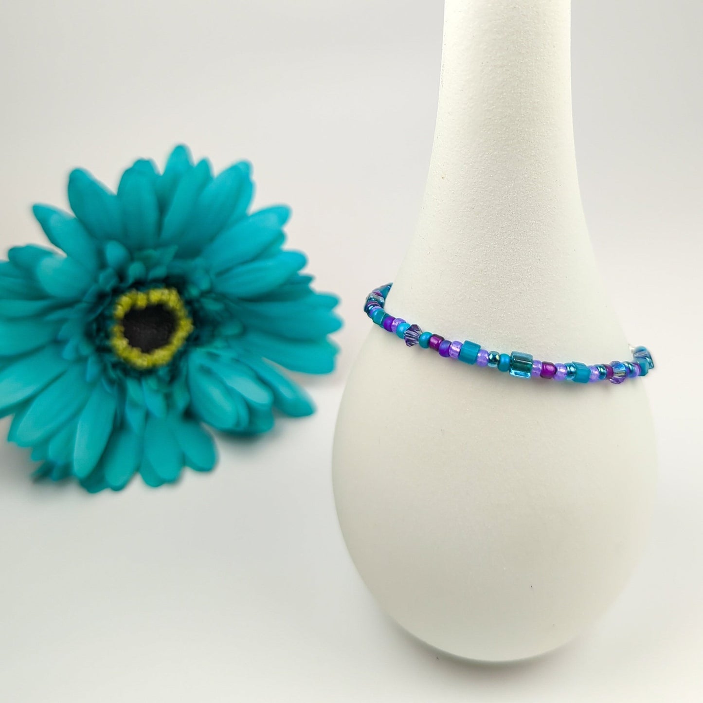 Assorted shaped glass seed beads - Purple and teal bracelet