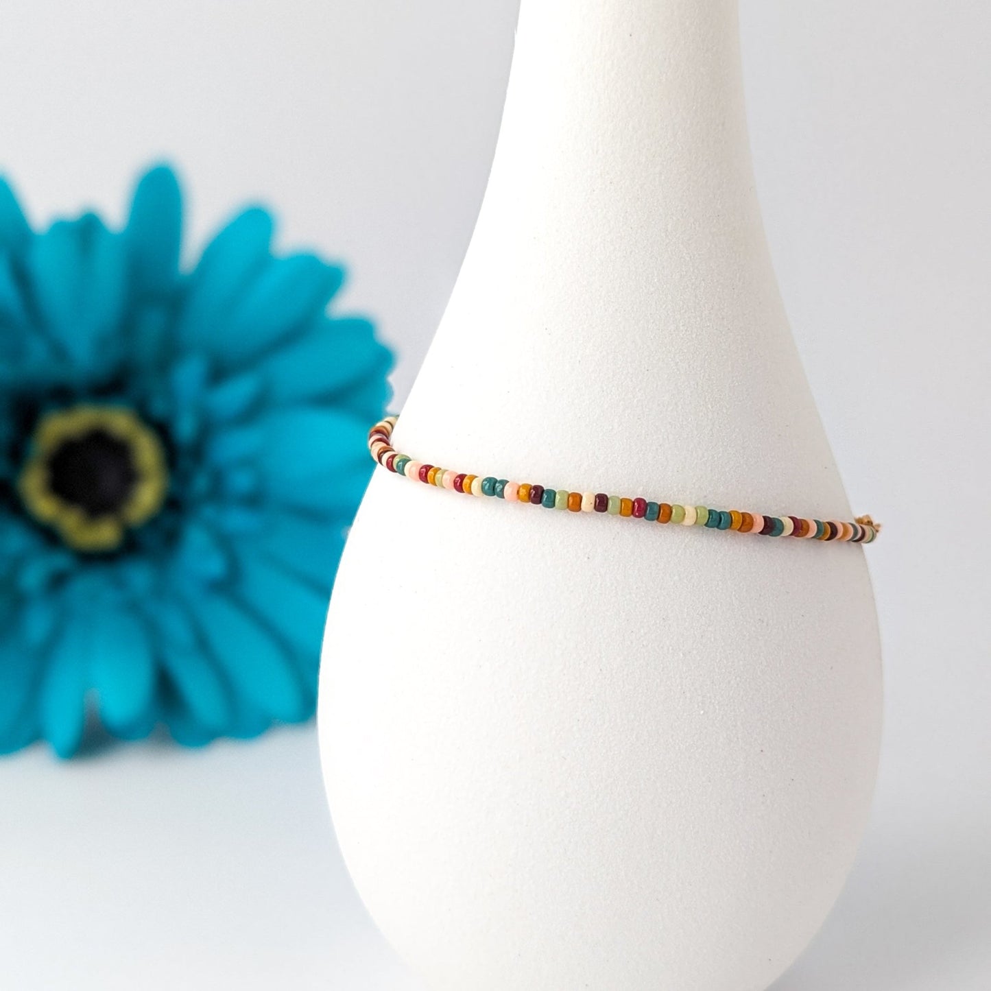 Dainty bracelet - tan, brown, blue and green glass seed beads