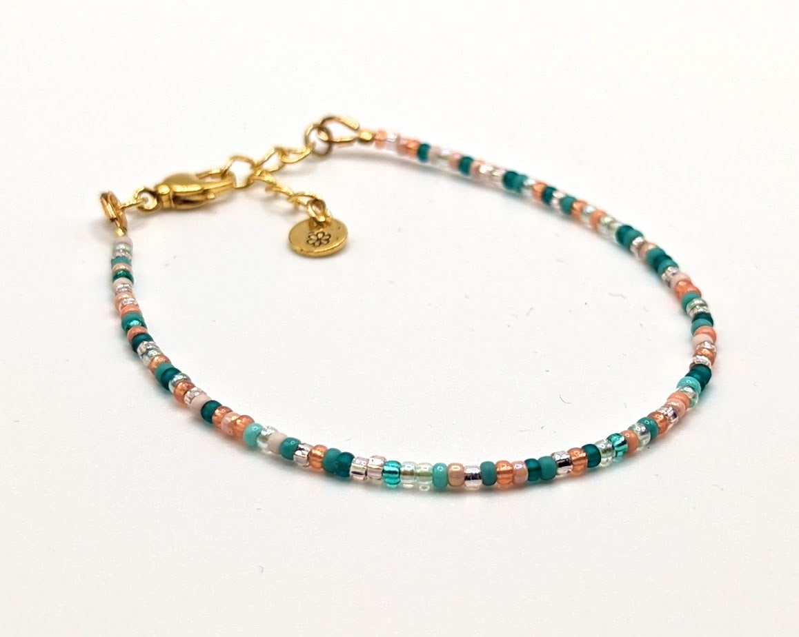 Dainty peach and teal glass seed bead bracelet