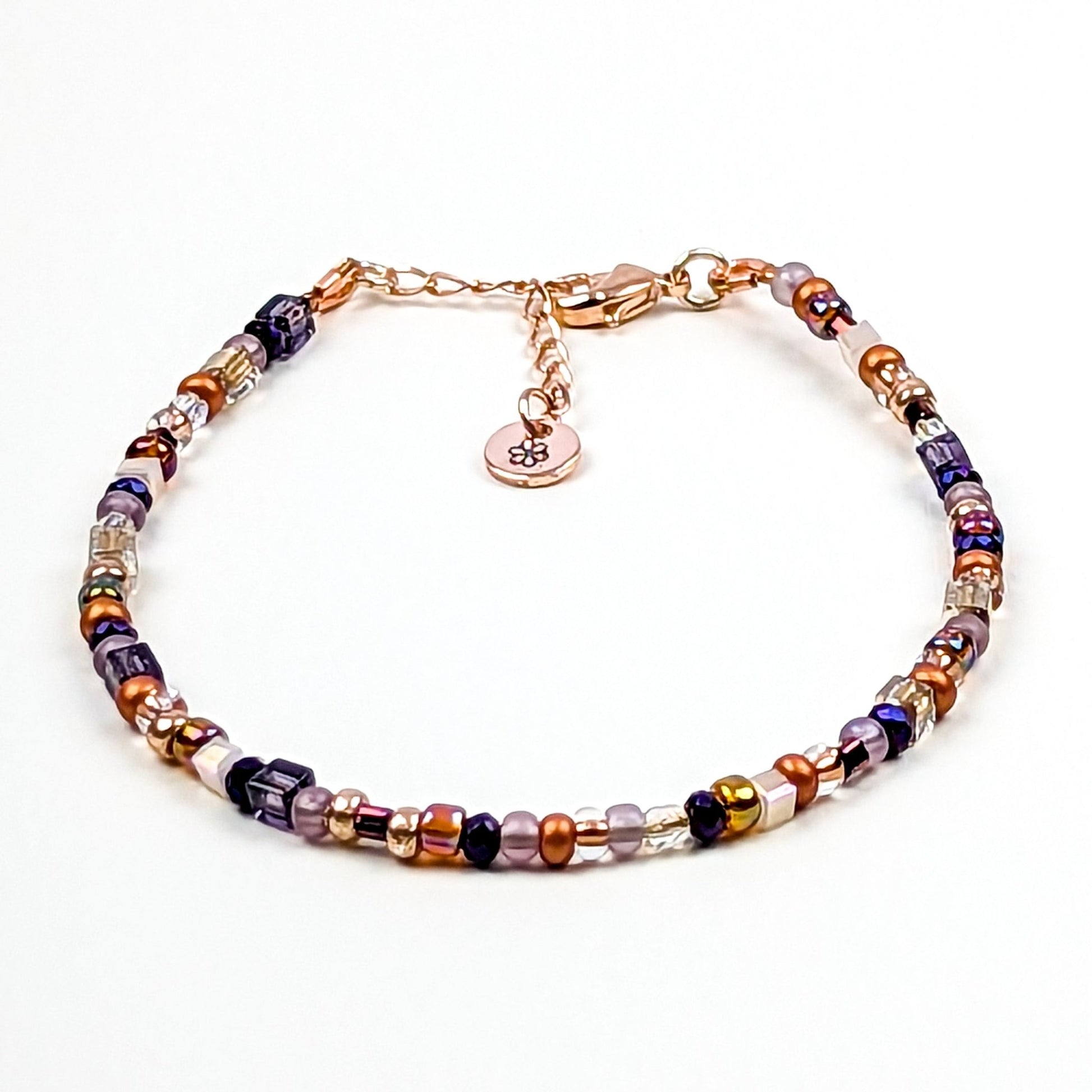 Assorted shaped glass seed beads - Copper and Purple bracelet - creations by cherie