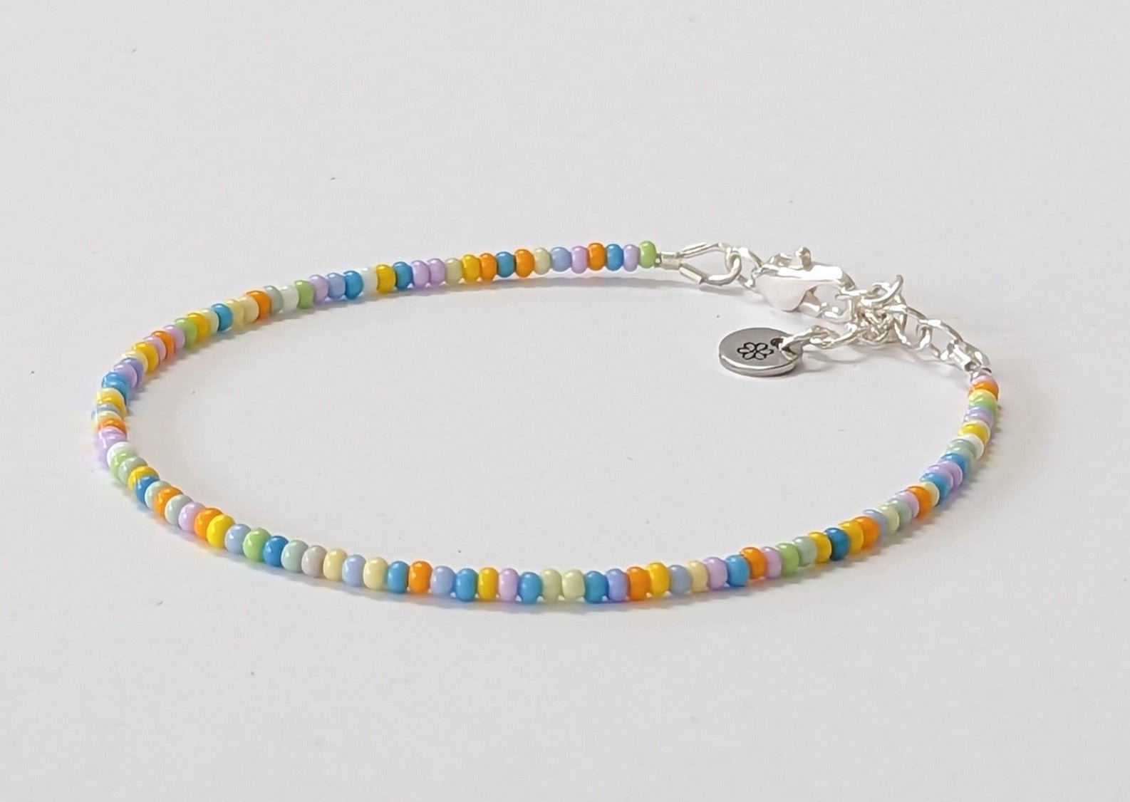 Dainty bracelet - Pale blue, orange and yellow seed bead bracelet - creations by cherie