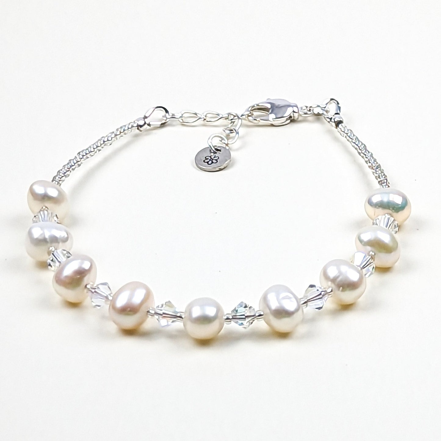 Fresh water pearl and crystal bicone handmade bracelet - creations by cherie